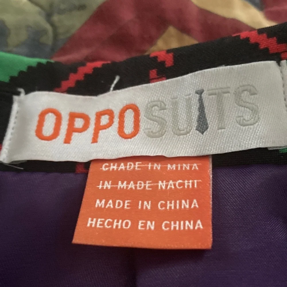 OPPO SUITS Christmas Blazer Mens 36 red and green design on black background